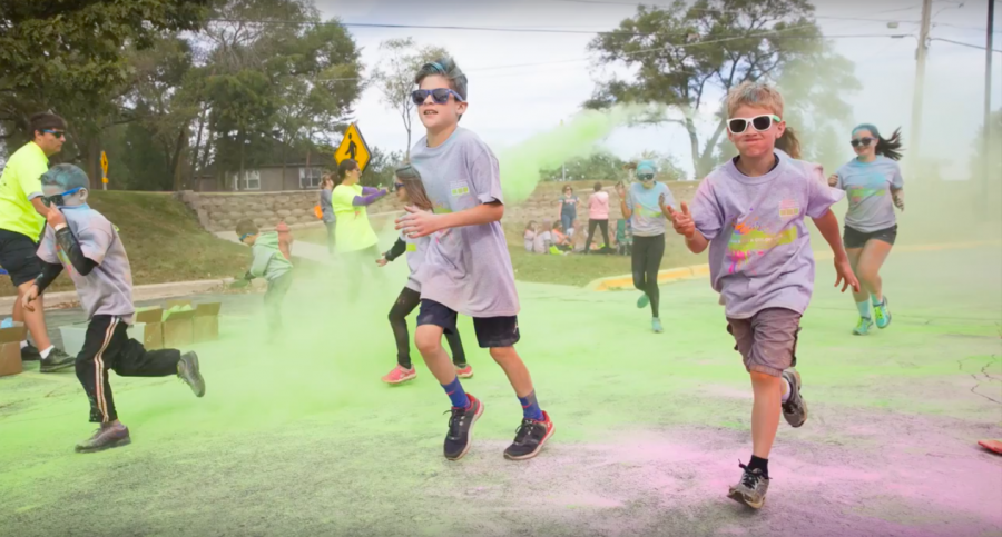Elementary schoolers dash through colorful powder during last years Bears on a Color Run. The coordinators of the event hope to draw an even bigger crowd this year.