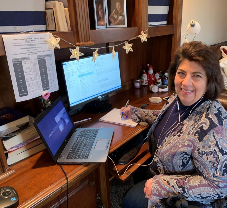 Rose Weismann, literacy resource center aide, working at her home office. In the past few months, she says she has been busier now than ever as she helps students navigate the difficulties of digital learning.