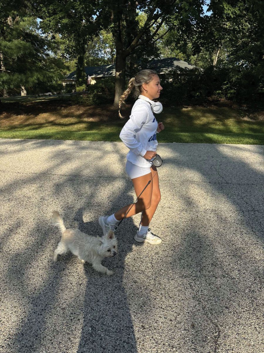 Zalewski goes for a run with her dog. Running helps her to stay fit over summer. (Photo by Maya Zalewski)