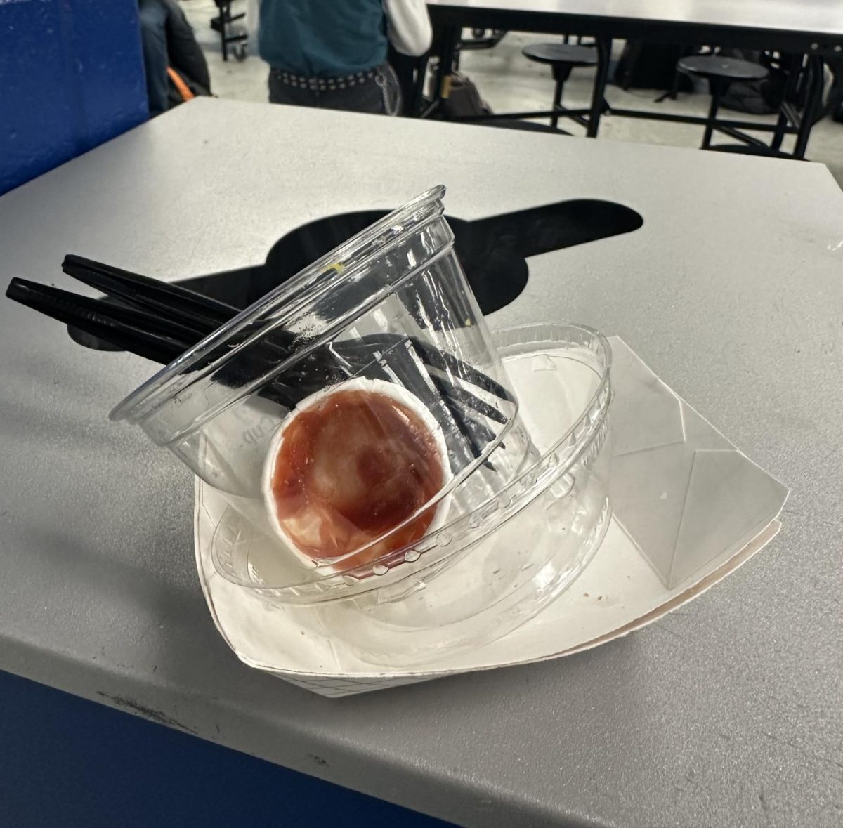 A mix of recyclables and non-recyclables in the cafeteria, where the majority of the plastic is recycled at the school. According to Ide, a reusable container would be more ecofriendly then a single-use plastic.