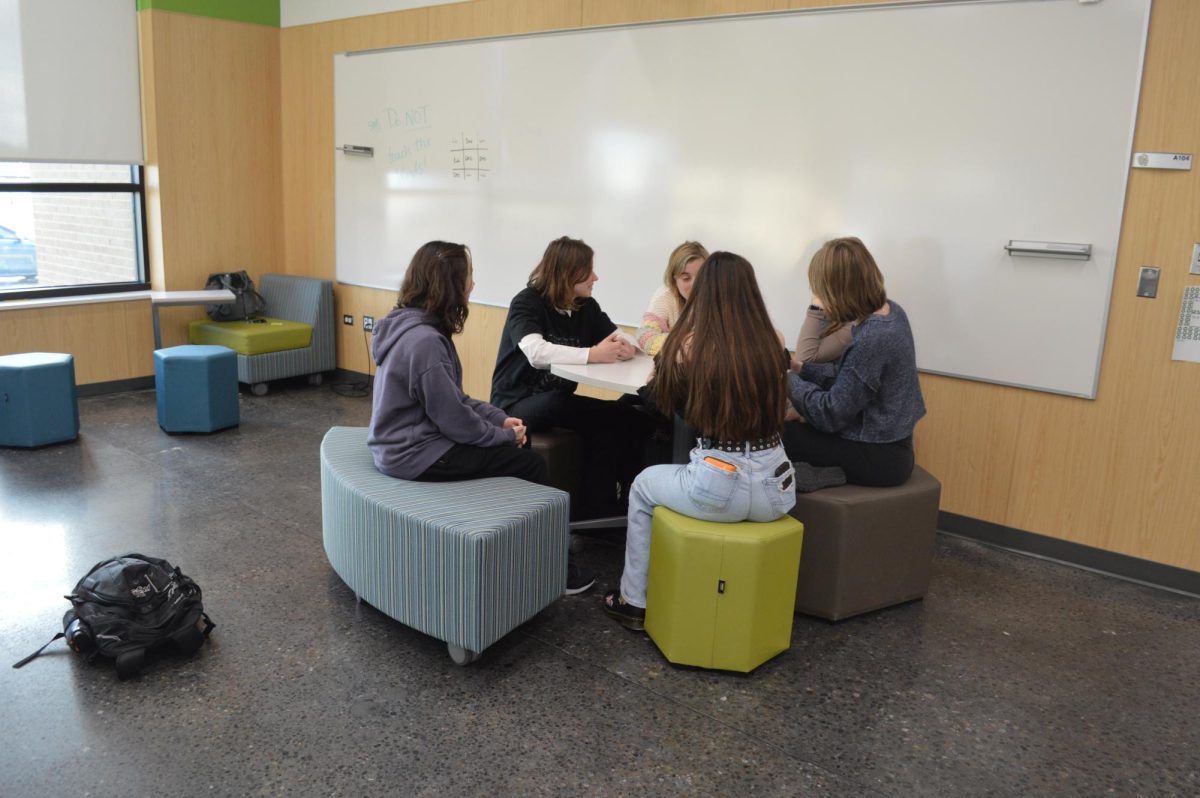 Students using the furniture in the lower Hub. The furniture in the Hub, lower Hub, and Studio C is similar to the furniture that will be installed in almost every classroom at LZHS during this summer. 