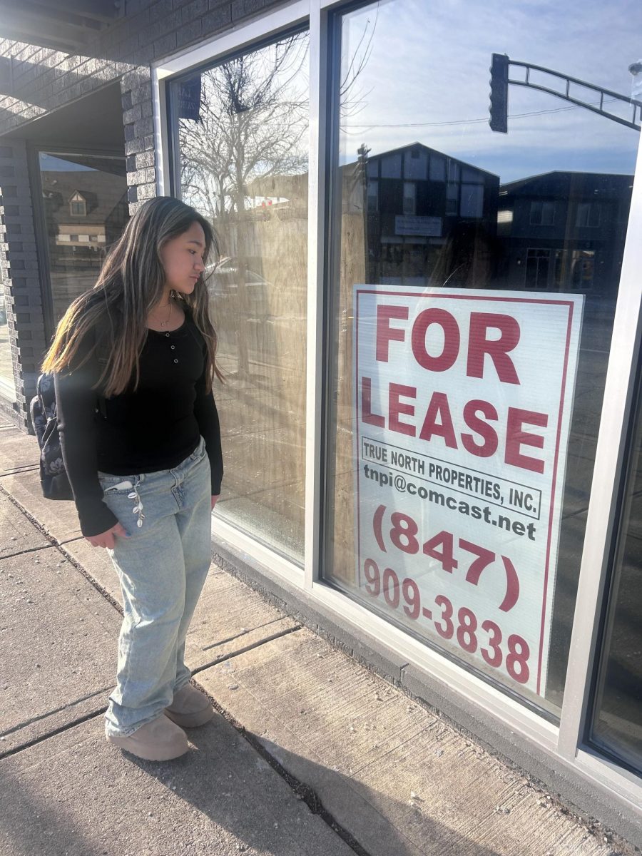 Danielle Candelaria, sophomore, stares at the lease sign, reminiscing on her last summer here. Her sentiment is shared by many students.